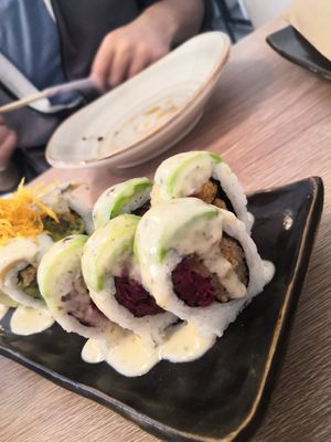 Flambéd sushi at Asianica in Lima