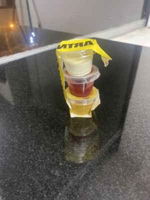 Mayo, ketchup, honey mustard (not pictured: tartar)   at La ReContra in Lima