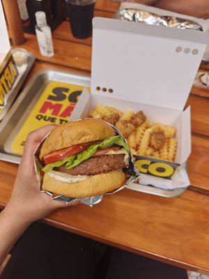 Cheese bacon burger, combo deal with fries&nuggets at La ReContra in Lima