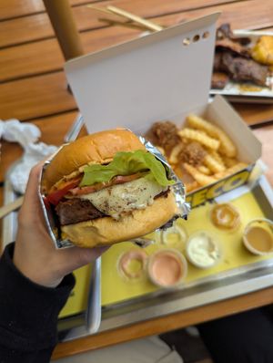 Cheese and bacon burger combo at La ReContra in Lima