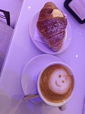 Nice soy cappuccino with croissant at Cafè Vanity Sessantasette in Bologna