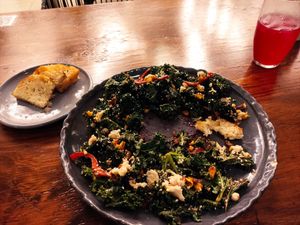 Kale salad with baked almond feta, olive oil bread and homemade beetroot lemonade at Pianta in Bogota