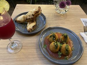 Arancini and bread  at Pianta in Bogota