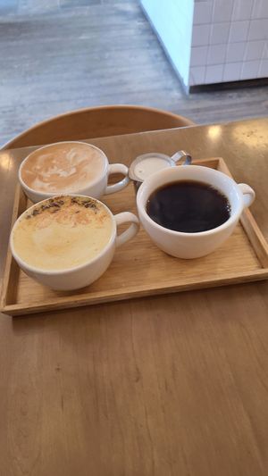Oat Latte, Mellow Yellow Latte, and Coffee at Cafe Mosaics in Edmonton