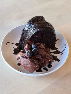 Chocolate Cake served with Chocolate Ganache 😍 at Cafe Mosaics in Edmonton