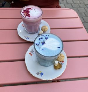 Pink latte and blue moon latte (cookie is not vegan)  at Spread The Moon in Brussels