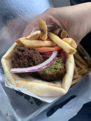 Falafel pita no tzatziki comes with tomato, onion, and fries.  at yērōs - authentically Greek in St James