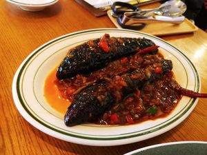 Stir fry eggplant before cutting at Alt.a in Seoul