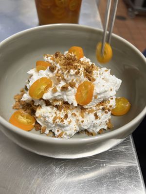 Horchata rice pudding with kumquat and cookie crumble   at Olivia Restaurant in Los Angeles