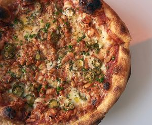 Anderson “kimchi” pizza   at Olivia Restaurant in Los Angeles