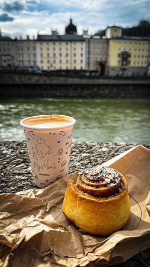 Flat white & cinnamon roll    at My Mom's in Salzburg