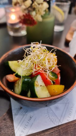 Side salad with sandwiche at Earth House Restaurant And Wine Bar in Bangkok