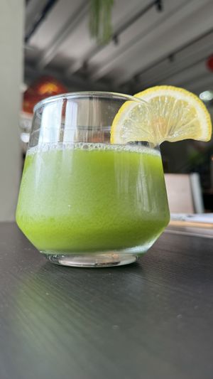 Dark green cold pressed juice   at Earth House Restaurant And Wine Bar in Bangkok