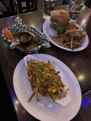 Vegan poutine, smoked applewood wings, vegan burger   at Leopold's Tavern in Victoria
