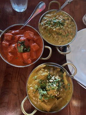 (Left) Tofu masala, (top) veggie korma, (bottom right) baingan bharta   at Tikka & Grill in Denver