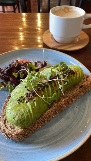 Latte with soy milk and mushroom and avo toast   at Cappuccino Cafe in Cusco