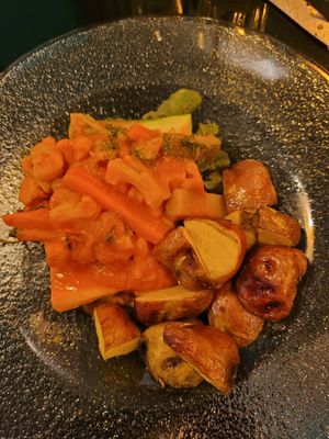 grilled potatoes and veggies with a nice sauce at Ylla Organic Fusion in Aguas Calientes