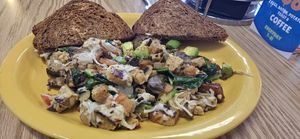Vegan Dana's Tempeh Skillet with Vegan cheese substituted for dairy, added avocado and rye toast at Walnut Cafe in Boulder