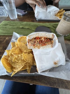 Jerk chkn on sourdough with chips and quesoadillas  at Royal Health World Retail & Cafe in Atlanta