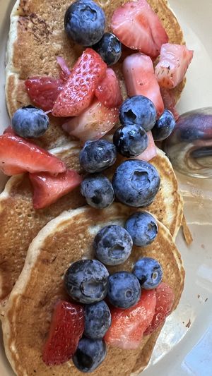 Banana Pancakes with Berries  at Snooze in San Diego