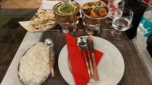 Vegan aloo gobi (to the right) at Holi Diwali in Sagres
