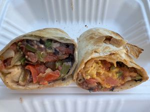 vegan burrito:
Black bean spread, salsa, cheddar, beyond sausage, JUST egg patty, paprika aioli

potato burrito:
Home fries, black bean spread, fajita veggies, salsa, paprika aioli at Prince Street Cafe in Lancaster
