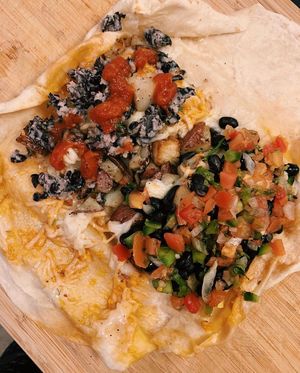 The Inside of The Vegan Potato Burrito (with added salsa).  at Prince Street Cafe in Lancaster