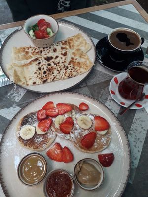 Vegan peynirli gözleme (cheese pastry) and pancakes with tahini, jam, peanut butter, banana, strawberry at Sis&Bros Cafe & Şarküteri in Istanbul