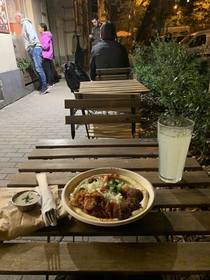 Tables and food   at Hummus Bar - Nagymező utca in Budapest