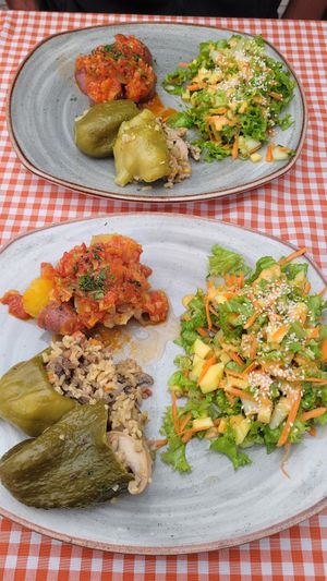 stuffed cucumber with rice, side salad with mango and vegetables in tomato sauce at Dicha Chibcha in Villa De Leyva