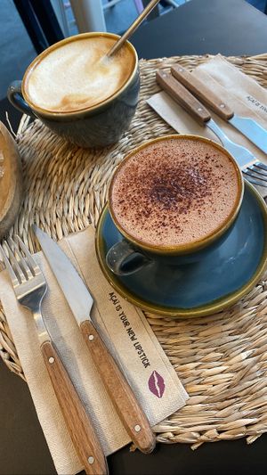 Hot chocolate and oat latte    at Açaï & You - Rue Dauphine in Paris