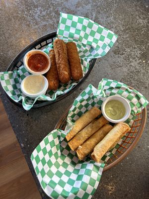 Mozzarella sticks and taquitos yum !  at SportsBox in Portland