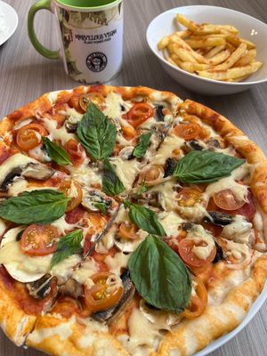 Pizza Napolitana con papitas at Marvelous Vegan Plant Power Food in Bogota