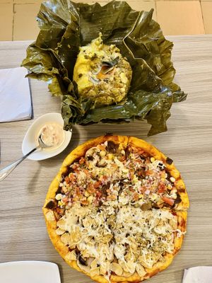 Tamal & no chicken pizza  at Marvelous Vegan Plant Power Food in Bogota