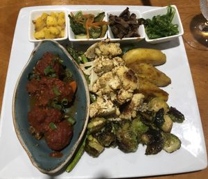 Vegan platter upon request!   Mine included vegan stuffed mushrooms, asparagus, plantain, cauliflower, Brussel sprouts and a variety of pickled salads.  Yum!  at The Galleon in St Croix