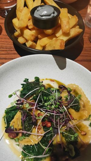 Pumpkin ravioli and fries with vegan aioli. at Soul Quarter in Christchurch