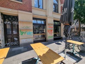 On the corner, outdoor seating at Tigermilch in Cologne
