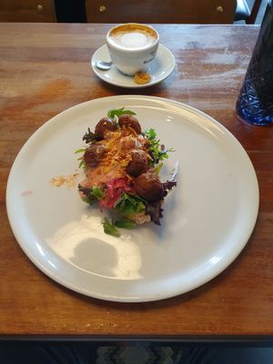 Vega Köttbullar Smørrebrød with a soy cappuccino. The cookie was not vegan. at Fika in Nijmegen