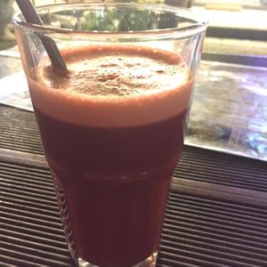 Beetroot, carrot and apple juice (50 baht). I don't know why they only filled three quarters of the glass. at Beetroot Stories Cafe in Chiang Mai