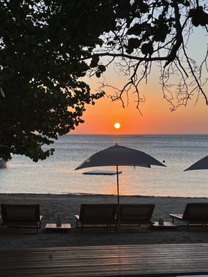 At sunset they rang a bell and gave everyone a champagne toast when the sun slipped into the water   at Luna Muna at Ibagari in Roatan