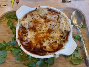 Deliciously satisfying Onion Soup with vegan cheese at Café de la Gare in Rosemere
