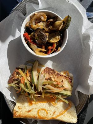 Bah Mi Todu sandwich with a side of veggies  at Union Bar & Soda Fountain in Fort Collins