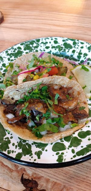 Mushrooms taco below and Baja taco on top at Penelope's Vegan Taqueria in Chicago