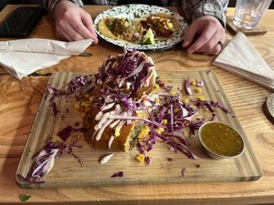 Chimichanga for me, and an el pastor and a carnitas taco for the hubby.  at Penelope's Vegan Taqueria in Chicago