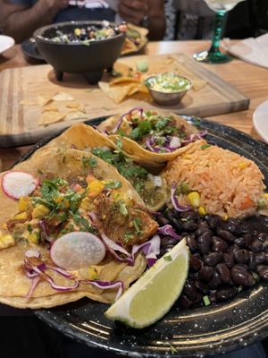 Al pastor, carnitas, and Baja tacos with vegan meat  at Penelope's Vegan Taqueria in Chicago