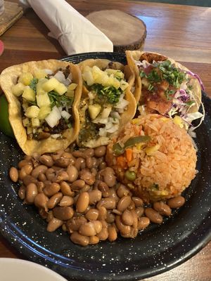 Carne asada tacos w pineapple added and Al pastor taco   at Penelope's Vegan Taqueria in Chicago
