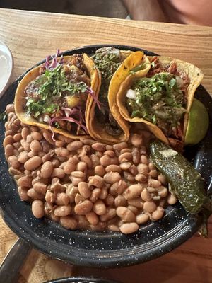 Theee tacos: Cauliflower Al Pastor, Mushroom Chimichurri, and the jackfruit taco with double beans    at Penelope's Vegan Taqueria in Chicago