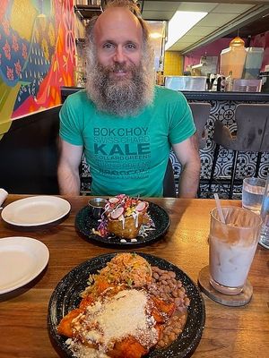 Chimichanga (back) and enchilada + classic horchata (front) at Penelope's Vegan Taqueria in Chicago