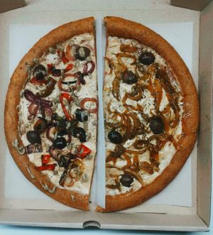 Pizza para compartir, mitad brasa vegana + mitad cebolla caramel vegana at AHORA Pizza in San Rafael