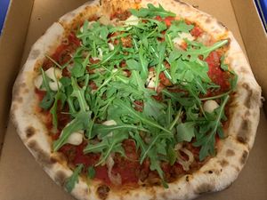 Sausage and caramelised onion  at Amalfi Pizzeria in Clayfield